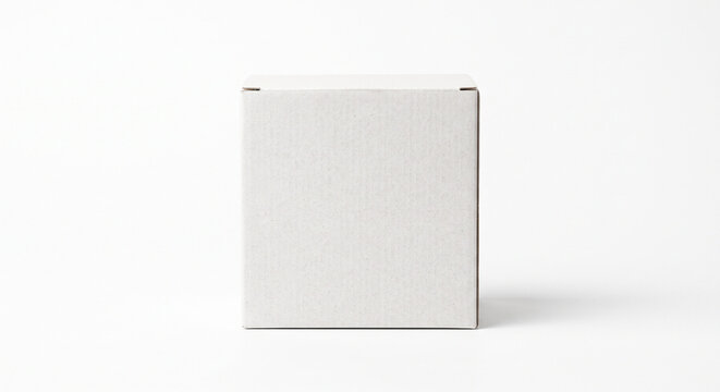 Plain white cardboard box packaging isolated on a white background with copy space for product branding or shipping designs vertical