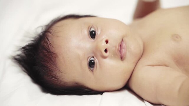 7 Weeks Old Baby Boy Closeup of Face Burp