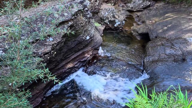 Small Waterfall Flowing Over Rocks in Wentworth Falls Australia