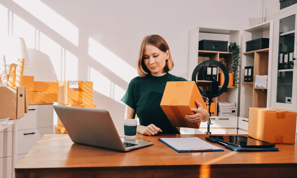 Logistics, small business woman with checklist for stock, clothes order or retail inventory management. Shipping, writing or person at ecommerce startup store for sme delivery with fashion designer