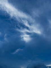Obraz premium Wispy White Clouds in Deep Blue Sky