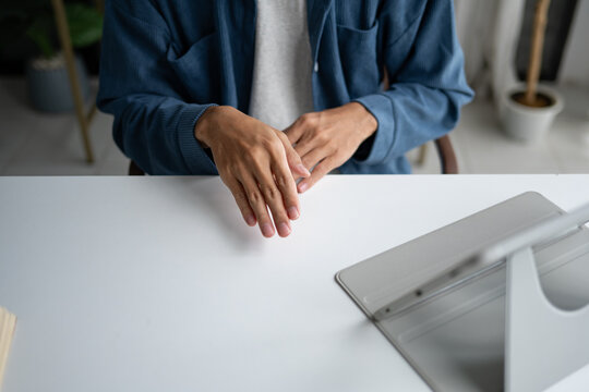 Close up of man using sign language for ASL for accessible online learning and virtual communication.
