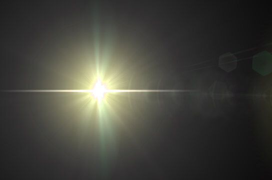 Cinematic soft lens flare with atmospheric haze and glowing hexagonal bokeh particles