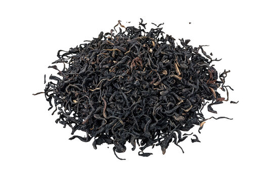 Loose black twisted tea leaves displayed on transparent background transparent background