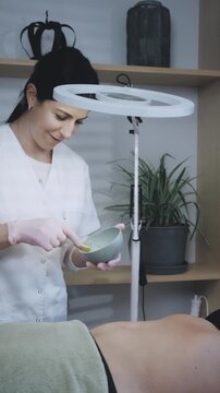 Esthetician Delivering Gel for Radiofrequency and Cryotherapy