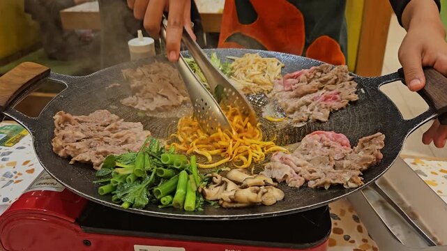 This is Korean BBQ style in a restaurant 
