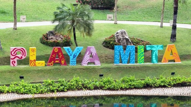 Colorful Playa Mita tourist sign in Punta de Mita Nayarit public park, medium closeup