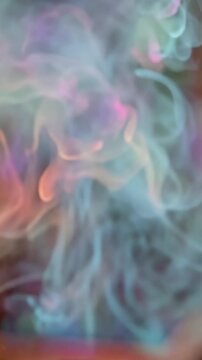 Mesmerizing Smoke Patterns: An Artistic Exploration of Colorful Swirls and Ethereal Effects Captured Over Time