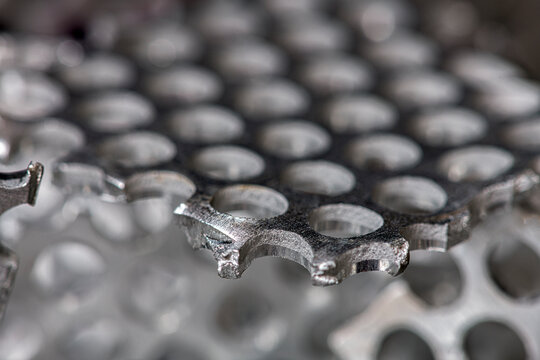 Close up of aluminum scrap pieces and non ferrous metal waste for recycling. Industrial material metallic textures, recycled resources, sustainability and raw industrial materials