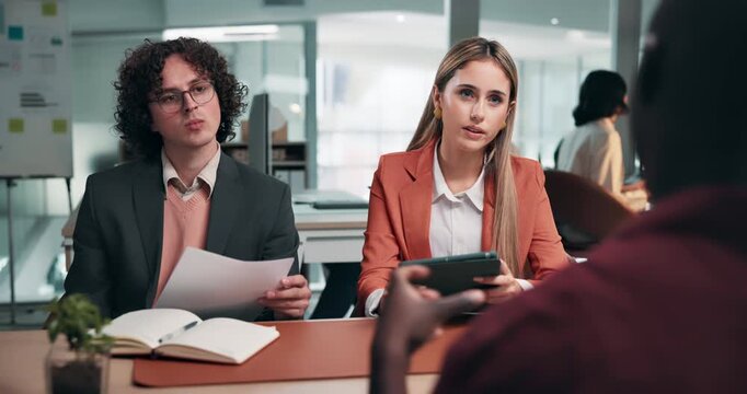 Interview, discussion or people in agency with meeting, evaluation or onboarding in hiring process. Paper, tech or HR team with review, candidate assessment or staff recruitment in career opportunity