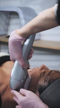 Aesthetic Specialist Delivering Targeted Facial Massage and Skincare Treatment With Therapeutic Technique