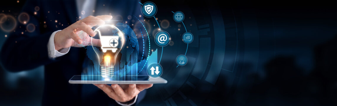 Businessman using a tablet to analyze E-Commerce data and digital innovation. Online shopping, digital retail, payment solutions, customer experience, business growth.