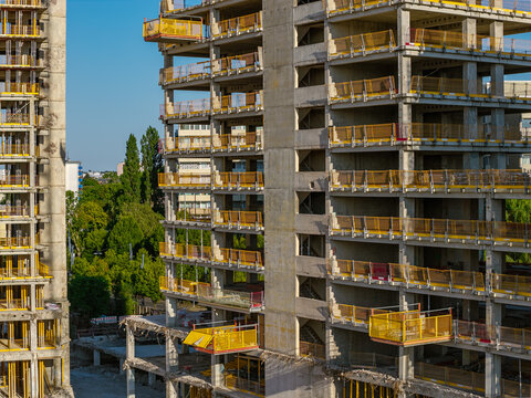 Aerial view of the construction site at Kaiserlei featuring gutted KWU towers undergoing dismantling with exposed concrete structures in Offenbach am Main, Hessen, Germany.