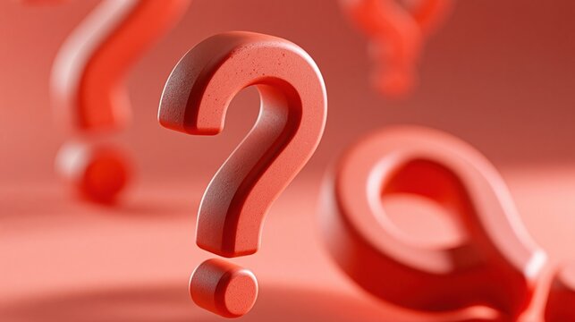 Close up of red question marks symbolizing confusion, inquiry, and the search for answers