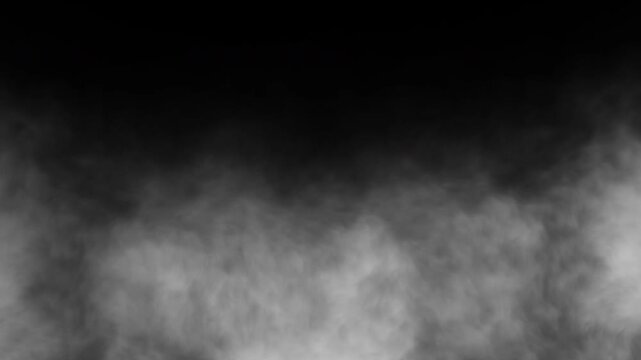 Dense ground fog and smoke overlay with soft swirling mist on a seamless black background for cinematic transitions