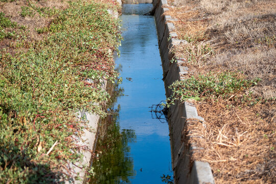 Concrete Drainage Channel Containing Standing Water