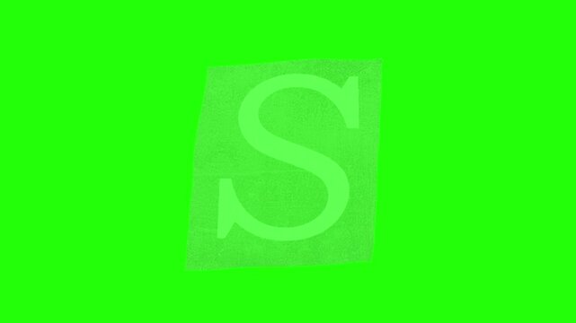 Person standing in front of a green screen. Chroma key backdrop for video production.