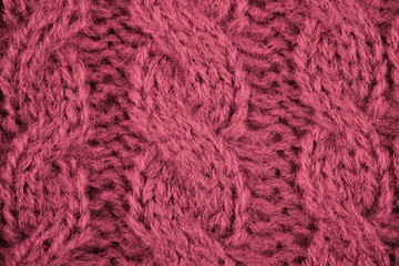 Deep pink cable knit texture with woolen material © reddish