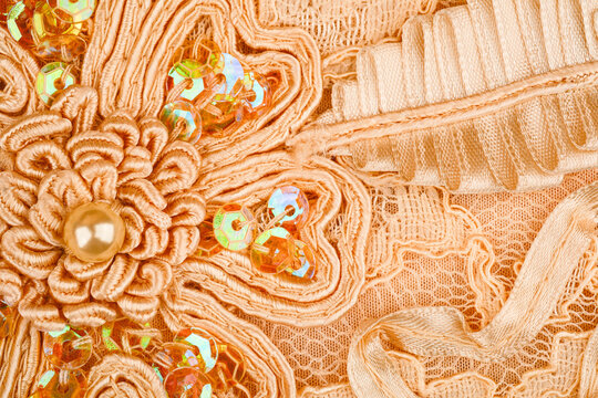 Peach fabric texture. Peach lace material background
