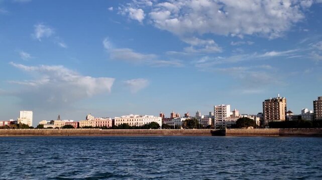 Coastal buildings and city walls at Baluarte de la Candelaria, Cadiz, Spain