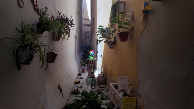 Narrow historic alleyway Callejon del Duende, El Populo district, Cadiz, Spain