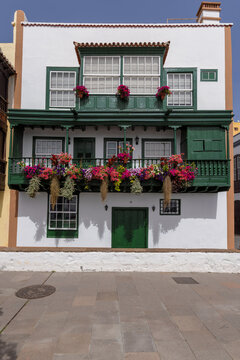 The Balcones de la Avenida Maritima, town houses with wooden balconies decorated with colourful flowers in Santa Cruz de La Palma, the capital of La Palma, Canary Islands, Spain.