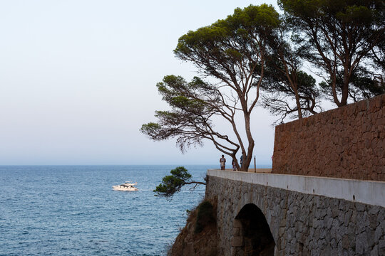 Tourists walking cami de ronda coastal path s'agar&oacute; costa brava