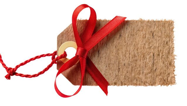 Brown cardboard tag with red ribbon bow and string, isolated on transparent background