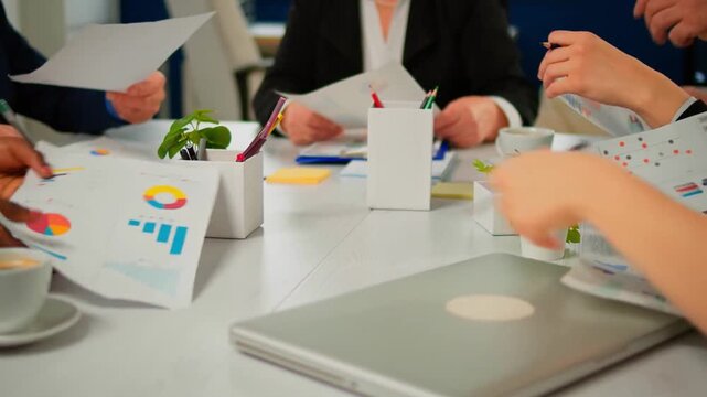 Hands, people giving documents in office for accounting, finance report and company funds. Staff, team workplace with paperwork, financial statement and tax compliance information. colleagues table