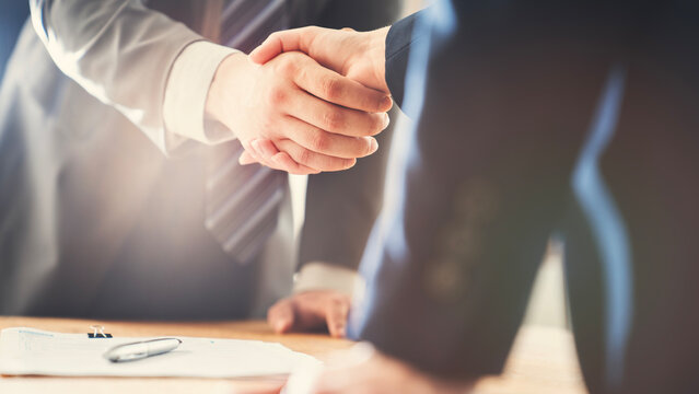Business handshake in the office
