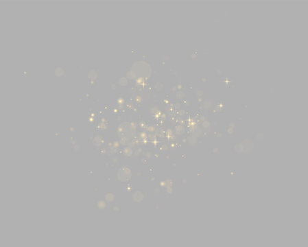 Scattered golden bokeh and star sparkle lights on a black background creating a magical glowing effect on transparent background