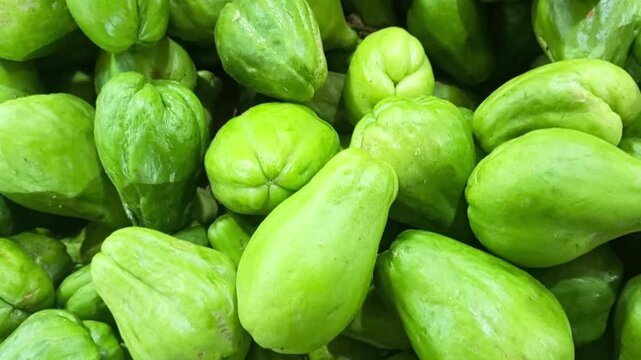 Fresh Green Chayote Squash Heap at Market