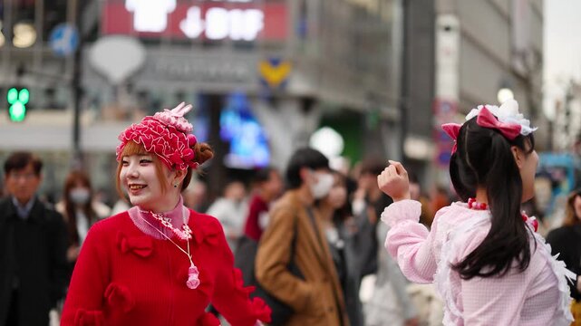 Japanese Women in Colorful Decora Fashion Dancing in Harajuku Tokyo