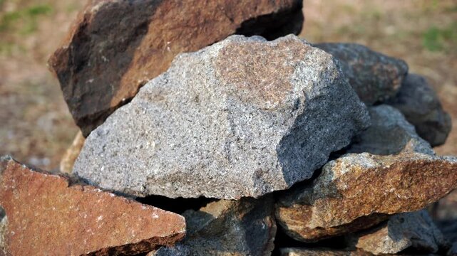 Natural Stone Rock Texture Background
A detailed close-up view of natural stone rock surface texture and rough organic shape, serving as an abstract background for design and geological concepts.