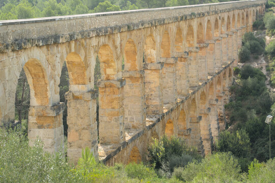 The Roman Ferreres Aqueduct Pont del Diable with two tiers of stone arches near Tarragona. Roman heritage in Catalonia