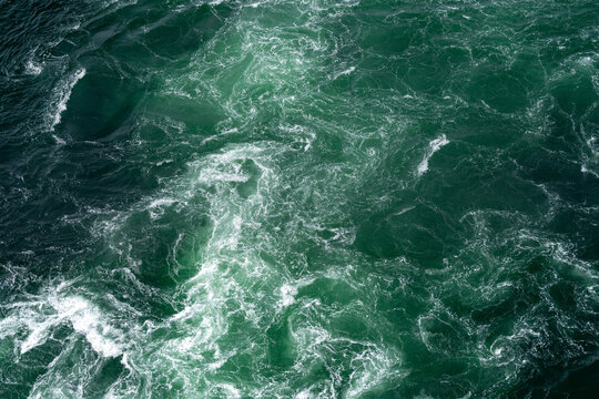Overhead view of a swirling Naruto whirlpool captured from Uzuno-michi walkway.
