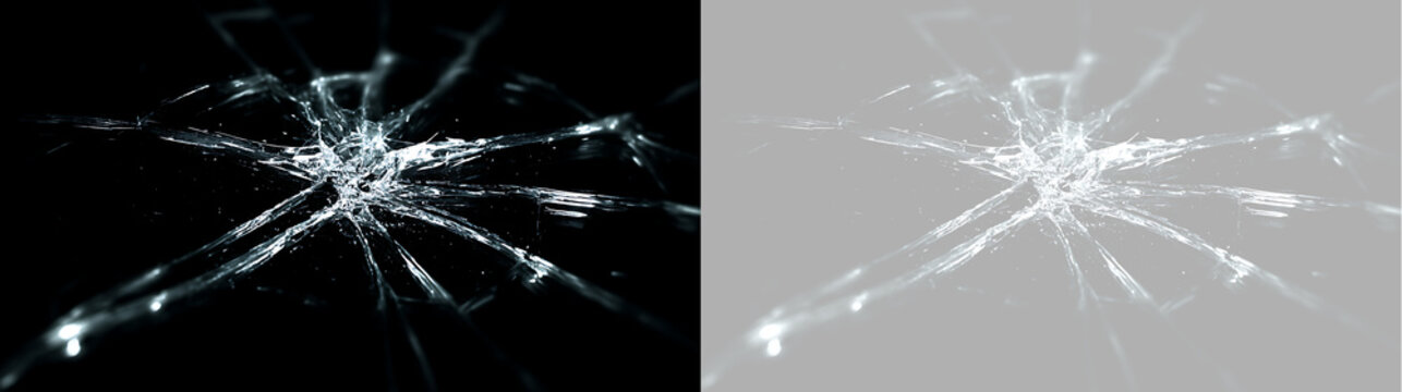 Cracked glass texture overlay with central impact point. Broken glass spiderweb cracks on black and transparent background