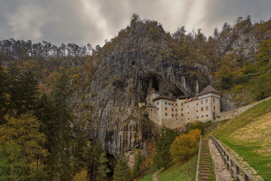Predjama Castle (Predjamski grad), Renaissance fort built for defense under a natural rock arch high in the mountain stone wall. Postojna-Slovenia-201