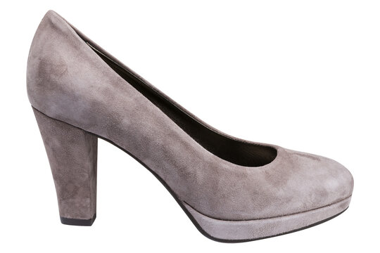 Women grey suede platform pumps isolated on white background. Elegant high-quality taupe chunky high heel shoes, side view.