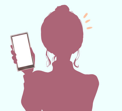 スマホを見せる女性　シルエット
