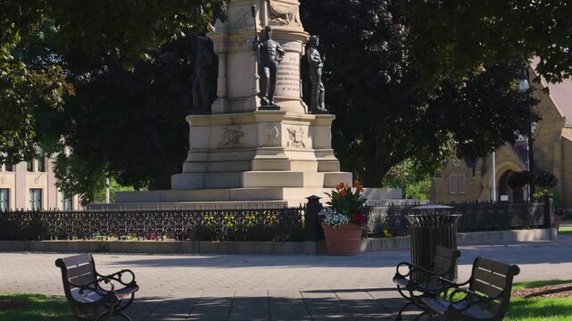 Slowly walking toward the central statue at Hackley Park.