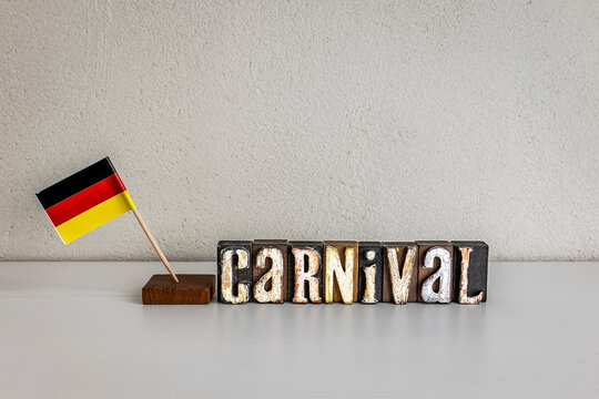 German CARNIVAL Celebration Concept with National Flag and Rustic Wooden Letters
