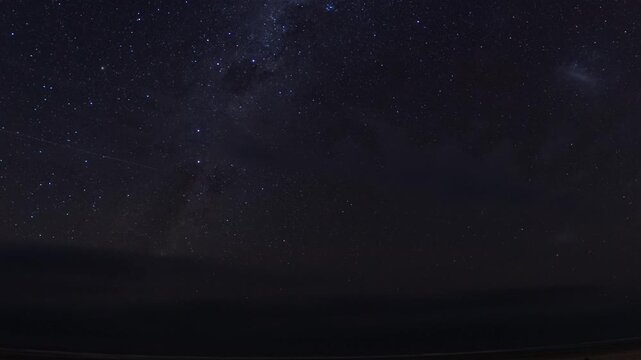 time lapse of stars and clouds