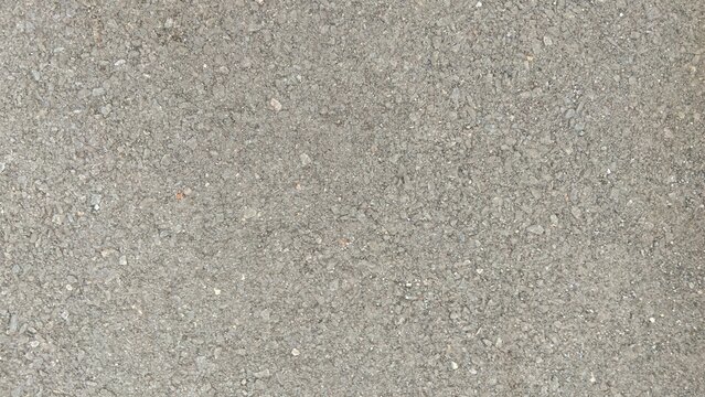 Grey asphalt road surface texture seamless top view background