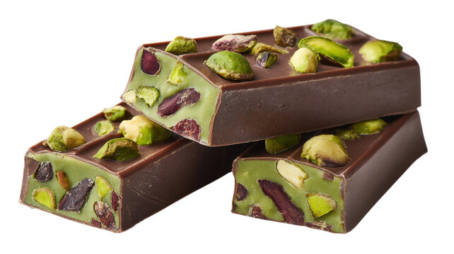 Three pieces of milk chocolate bars filled with whole green pistachio nuts, arranged on a solid black background, for a studio, product shot