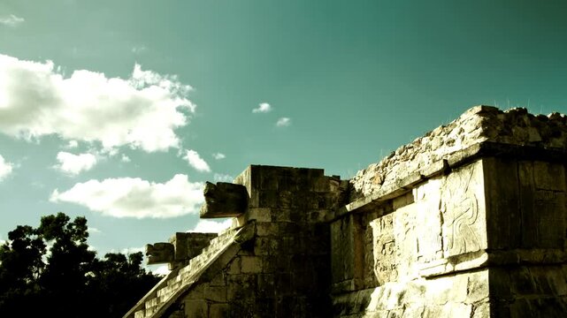 Time-lapse of Chichen Itza's El Castillo Pyramid with Serpent Heads and Moving Clouds in Mexico