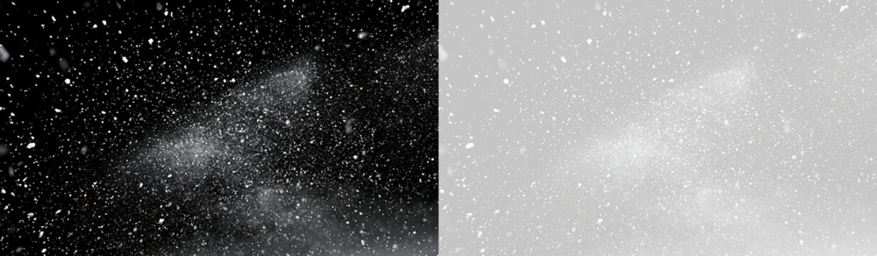 Blowing winter snow storm overlay on transparent and black background. Dense snowflake particles texture for compositing
