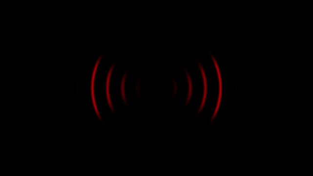Red radio wave signal with concentric circular lines radiating outward on a deep black background representing wireless communication technology