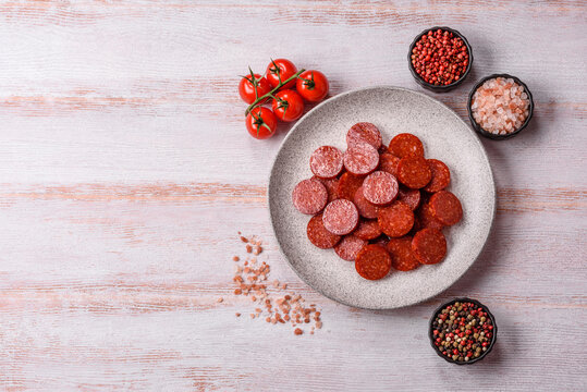 Slices of smoked pepperoni or salami for making homemade pizza. Sliced pepperoni