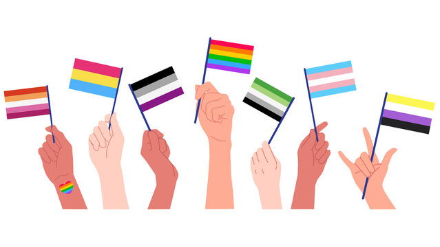 Diverse hands holding various LGBTQ plus pride flags on dark background